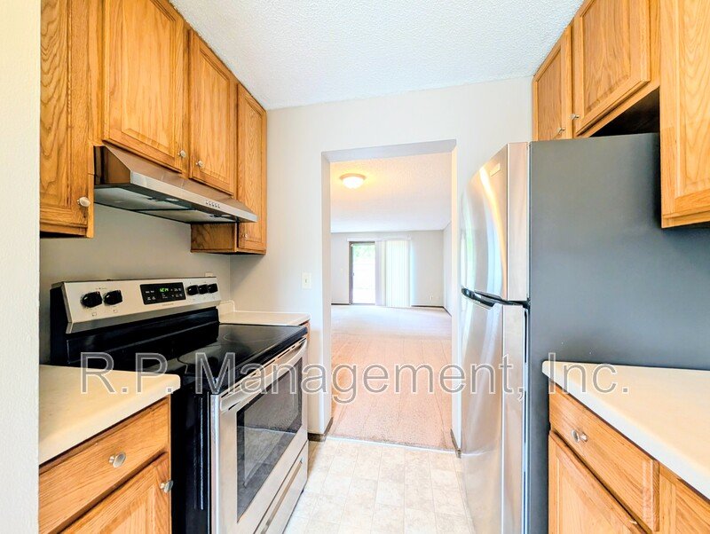 3 BR 2.5 bath end unit with all new paint and flooring.  Available 5/1 property image