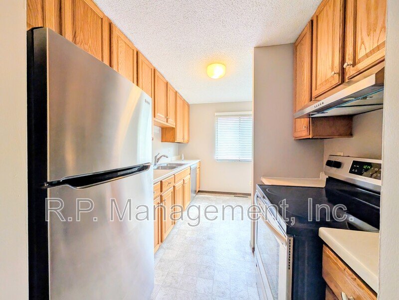 3 BR 2.5 bath end unit with all new paint and flooring.  Available 5/1 property image